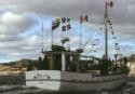 Boats from Arctic Quebec arriving in the Dorset harbour for a celebration of feasting and music…